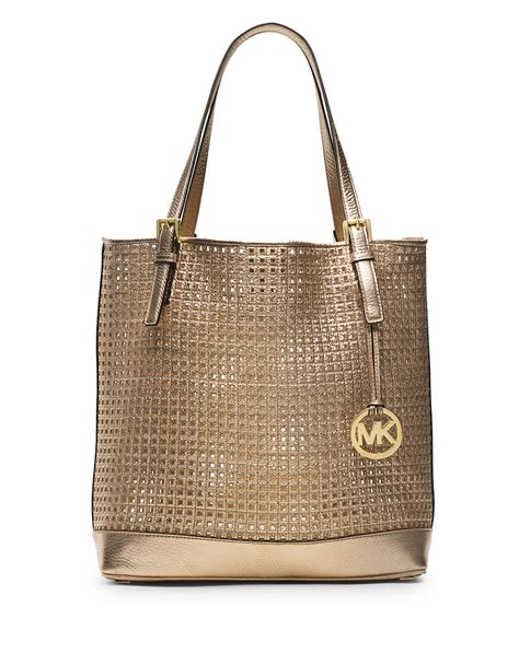 michael kors white purse with gold lock|Michael Kors large gold tote.